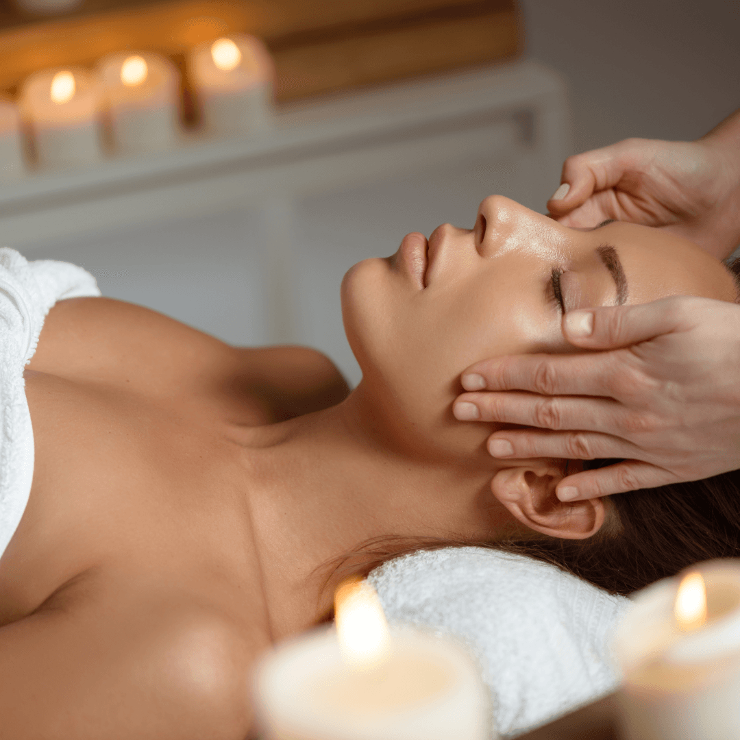 young-woman-having-face-massage-relaxing-spa-salon